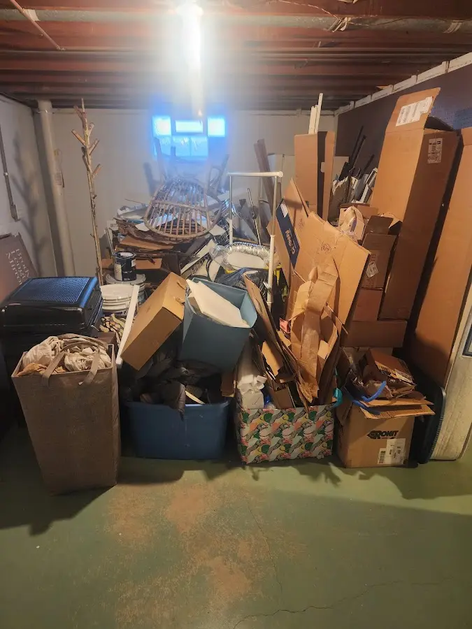 Roll-off dumpster container at job site for 15 Yard Dumpster Rental in Snowflake